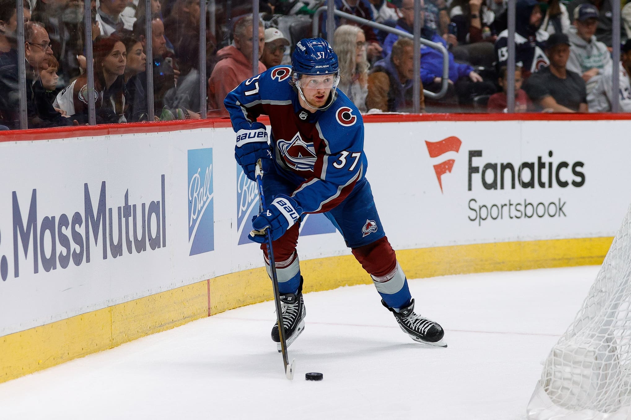 May 11, 2024; Denver, Colorado, USA; Colorado Avalanche center Casey Mittelstadt (37) controls the puck in the third period against the Dallas Stars in game three of the second round of the 2024 Stanley Cup Playoffs at Ball Arena. Mandatory Credit: Isaiah J. Downing-Imagn Images